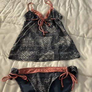 lot of 2 Two Piece Bathing Suits ￼ 1st picture size L and 2nd Picture Size 8